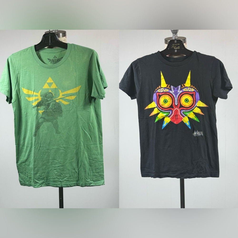 F1. Lot of 2 Zelda Graphic Tees – Triforce & Majora’s Mask size S/M